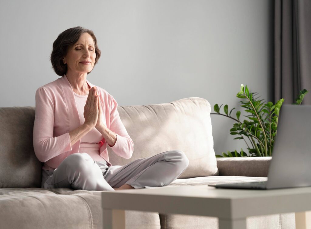 full-shot-woman-meditating-indoors